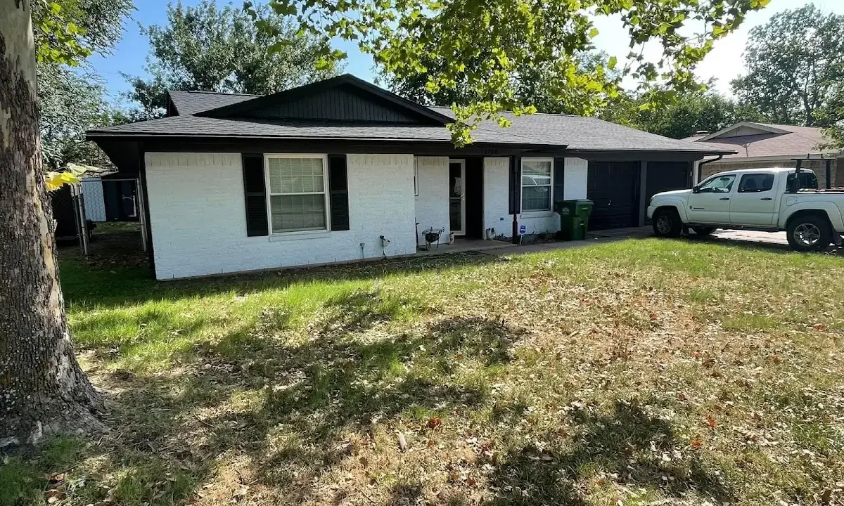 Professional roofing crew working on a residential roof in Broadlands